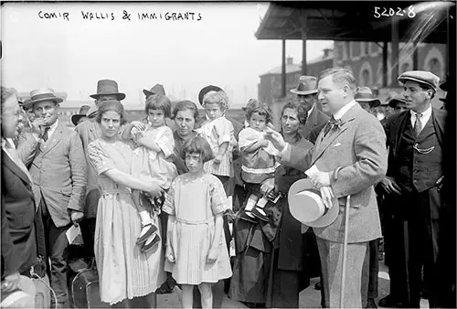 Ellis Island Commissioner, Frederick Wallis Posed With a Group of New Arrivals in June 1921.