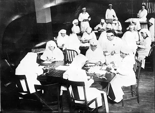 Back on the Job. Red Cross Women at the New York County Chapter at the Workroom at 82nd Street and Amsterdam Ave