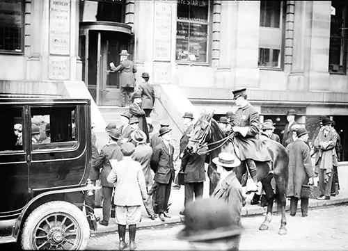 Getting the Latest News on the Titanic Disaster at the White Star Line Office April 1912