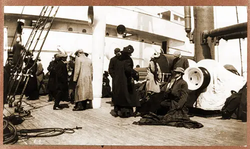 Groups of Titanic Survivors Aboard Rescue Ship Carpathia: Unidentified Group on Deck.