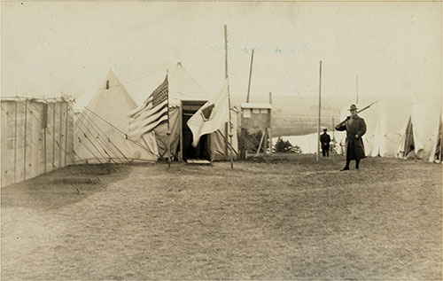 Guard Stationed Outside Major's Headquarters at the Special War Influenza Hospital, Emery Hill, Lawrence, Massachusetts Circa 1918.