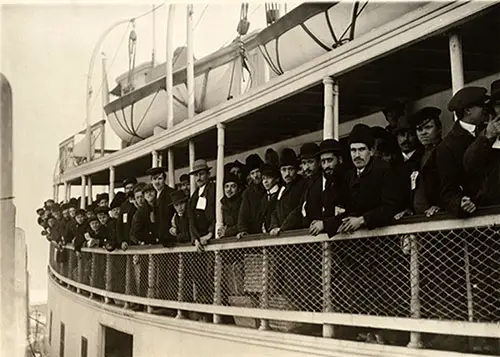Immigrants on Ferry Boat Approaching Ellis Island.