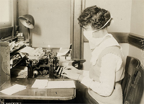 New York City Typist Wears Her Influenza Mask.