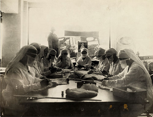 Red Cross Workers Combat the Influenza Epidemic Wearing Protective Masks in Seattle, Washingon, circa December 1918.