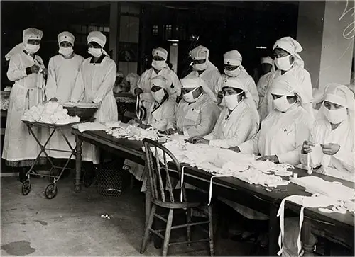 Red Cross Workers Making Anti-Influenza Masks for Soldiers in Camp, Boston, Massachusetts circa 1918-1919.