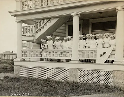 Volunteer Nurses of Red Cross Hospital Force on the Porch of Hospital During the Influenza Epidemic, Eureka, California, 1919.