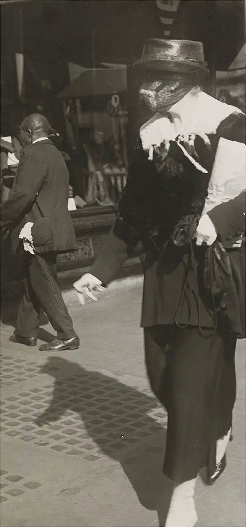 Young Woman Wears Mask on Shopping Expeditions During Influenza Epidemic, circa 1918-1919.