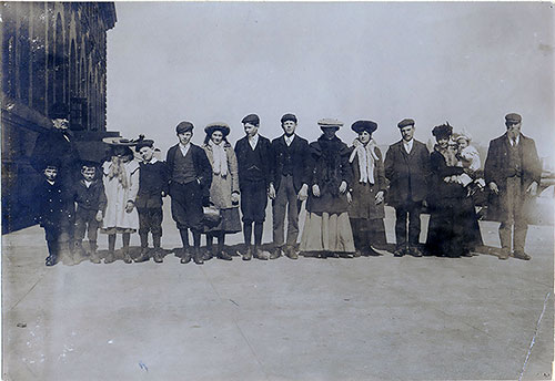 Prosperous Looking Immigrant Family of 14 at Ellis Island. nd. circa 1910.