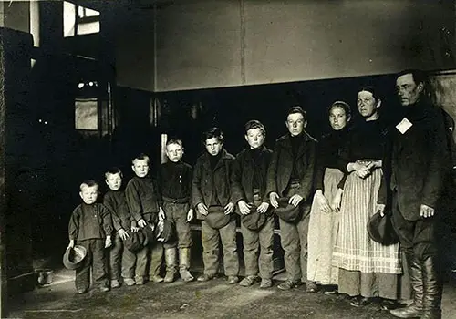 A Family of Seven Sons and One Daughter at Ellis Island circa 1905.