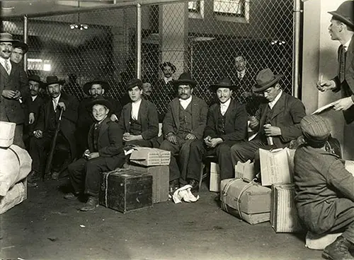 Group of Immigrants Waiting at Ellis Island, 1908.
