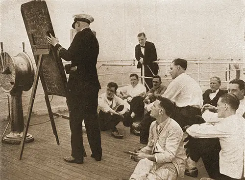RMS Aquitania Officer Gives a Talk on Boat Efficiency to Crew Members.