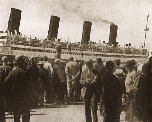 Crowds on the Pier Watching the Aquitania Depart from New York.