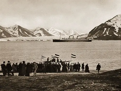 A Large Group of Passengers at Bellsund, Spitzbergen, Wait on the Shoreline to Ride on the Tender That Will Take Them to the Ss August Victoria.