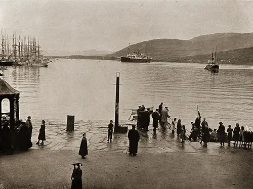 The SS Blücher on the Quay in Hammerfest, Norway. A Small Croud Waits at the Pier.