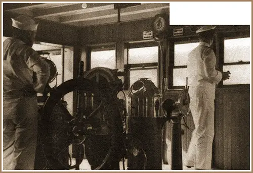 On the Bridge. Although a Quartermaster Stands Constant "Watch," There's a Mechanism That Automatically Keeps the Ship to Its Course.