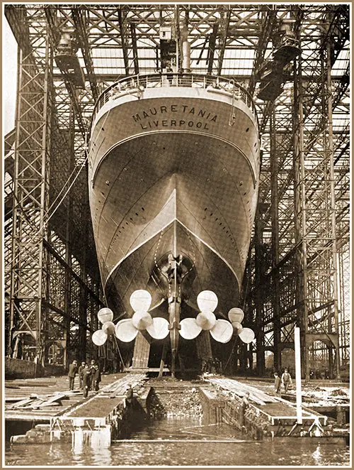 Plate LXVII Fig. 45:- Quadruple-Screw Turbine-Driven Cunard Liner Mauretania Ready to Launch.