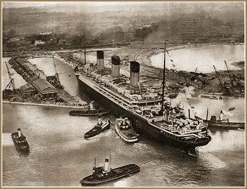 The White Star Line Majestic Enters the King George V Graving Dock at Southampton on 19 January 1934.
