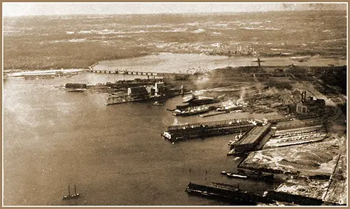 Western Maryland Railway, Port Covington Terminal. With Coal Pier and Grain Elevator in Background.