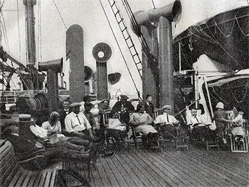 SS Albert Ballin third Class Passengers Relaxing on the Promenade Deck.
