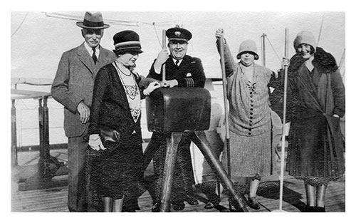 Miss Mulholland and Traveling Friends Pose with the Chief Officer of the SS Lapland During Voyage