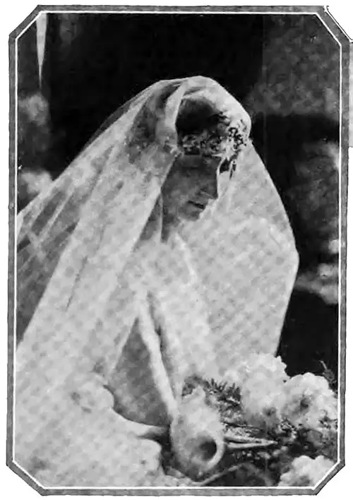 At Her Wedding to the Count de Leusse, Mlle. Kulp Shaped Her Crown of Orange-Blossoms to the Form of a Diadem. Vogue Magazine, 1 April 1922.