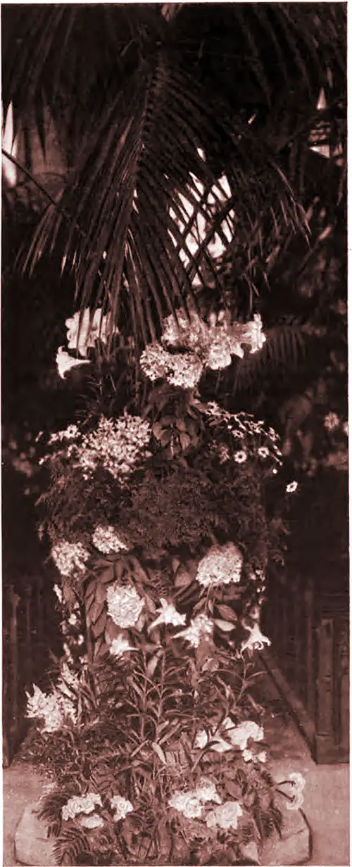 The Font, St. Margaret's, Westminster, as Decorated at a Recent Fashionable Wedding. Lady's Realm, June 1902.