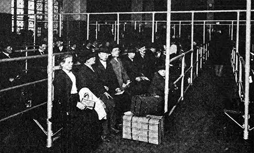 Immigrants in the Maze at Ellis Island, Waiting to be Inspected.
