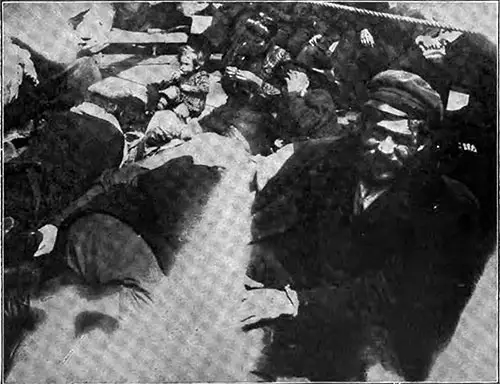 Steerage Deck Scene Showing How Days Are Passed in Crowded Conditions.