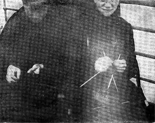 Thrifty Women in Steerage Seen Knitting Socks.