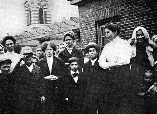 The Matron and Some of Her Charges on the Roof at Ellis Island.