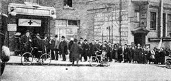 Line of Citizens in Seattle Waiting for Influenza Epidemic Masks at the Red Cross Headquarters.