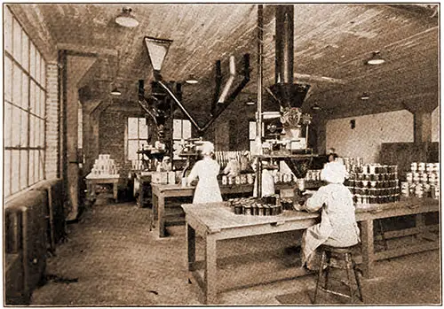 The Packaging Room for Coffee and Tea Has Several Scott Weighing Machines.