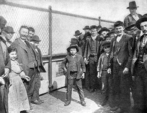 Italian Immigrants on the Roof of Ellis Island Buiding.
