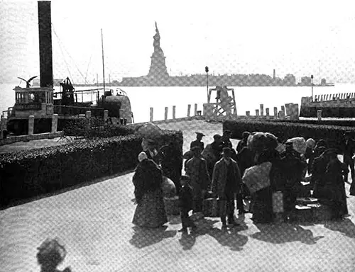 Newly Arrived Immigrants at the Docks of Ellis Island.