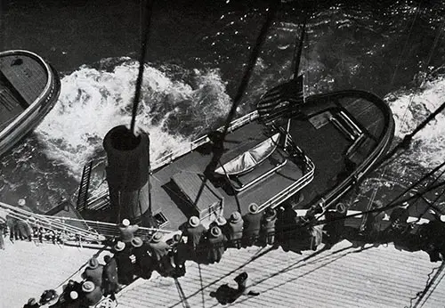 Tug Guides the SS Bremen into the Norddeutcher Lloyd Pier in New York Harbor.