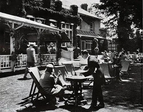 Tea on the Thames by Maidenhead / Burton Holmes from Ewing Galloway.