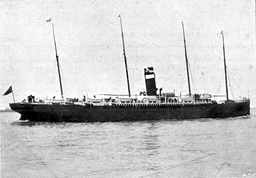 The RMS Parisian Passing Down the River Thames from the Surrey Commercial Dock in London circa 1907.