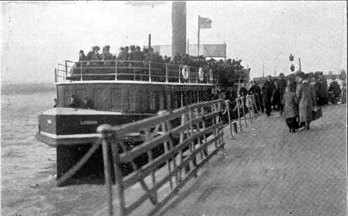 Passengers Embarking onto a Large Tender to be Taken out to the Ship.