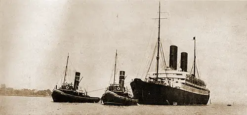 The RMS Caronia docking at Tilbury Docks, London in 1923