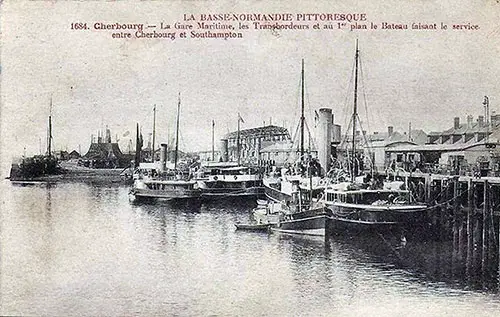 At Cherbourg, the Maritime Station, the Tenders, and in the Foreground, a Full-Service Boat that Shuttles Between Cherbourg and Southampton.