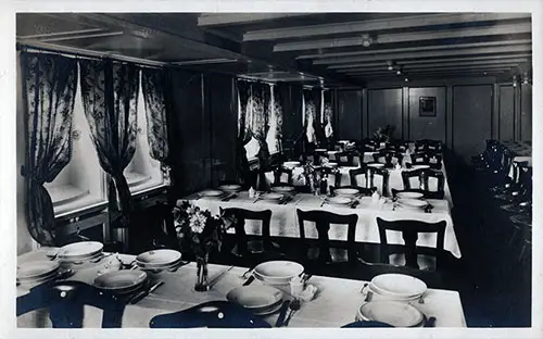 Front Side of a Vintage Postcard has Photograph of Third Class Dining Room on the SS Berlin, 1908.