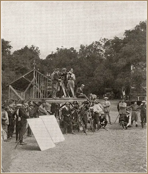 The Director and His Battery of Cameras in Action.