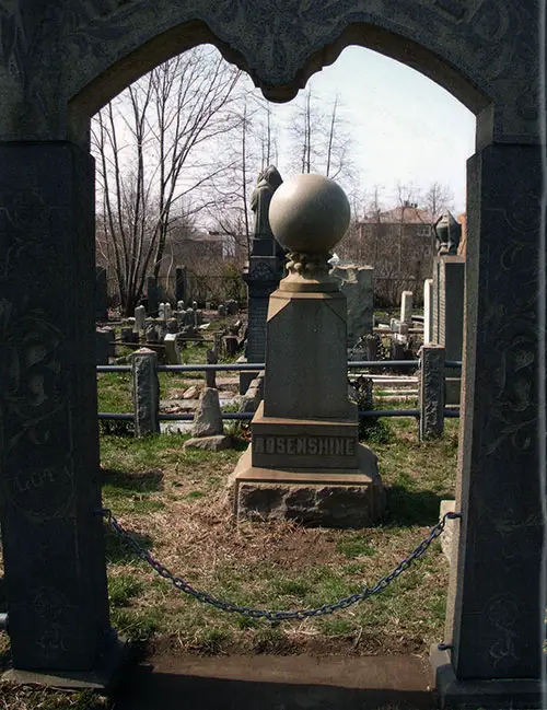 A magnificent granite arch is an entrance to the Rosenshine family plot in Bayside Cemetery