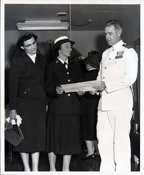 Capitolie A. Sutton, SR, Co. 1955-18(W) Receiving Honor Certificate