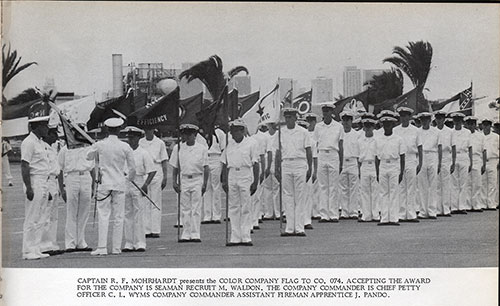 Captain R. F. Mohrhardt Presents the Color Company Flag to Co. 074.