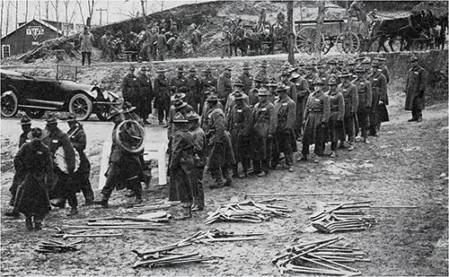 Front Ranks - Shovels; Rear Ranks - Picks. Training Cadets of the 3rd OTC at Camp Devens in 1918.