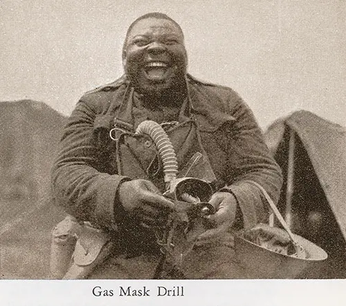 Black Soldier Prepares for Gas Mask Drill.
