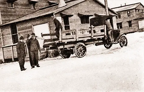 Ambulance Company Number 302 Loading Accumulated Garbage of the Day Into One of the Quartermaster's Trucks.