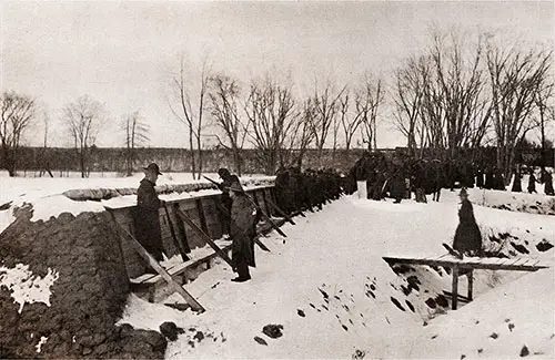 The Men in the Picture, Belonging to the 304th Infantry, Are Firing From a Trench Which Is an Exact Copy of a Firing Trench on the Western Front.