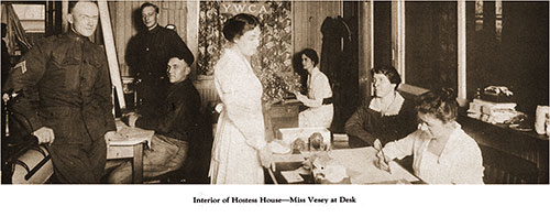 Interior of Hostess House - Miss Vesey at Desk. Pictorial Souvenir of Camp Zachary Taylor, 1928.